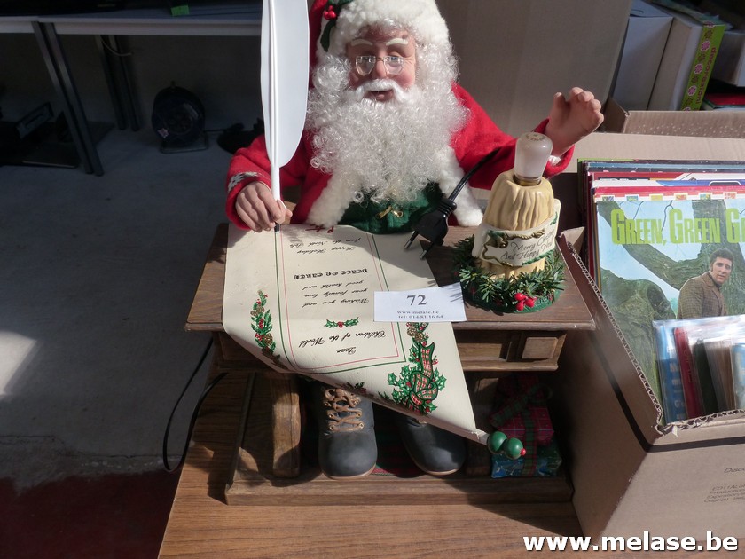 Kerstman aan lessenaar