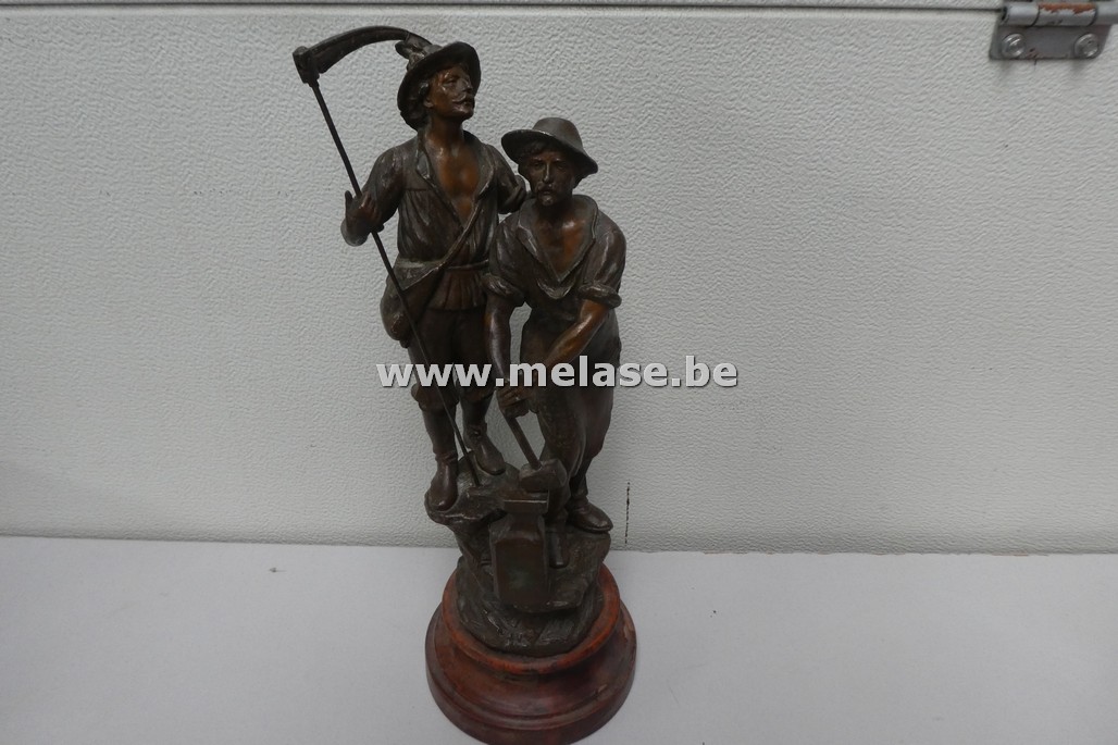 Beeld in zamak "werklui"